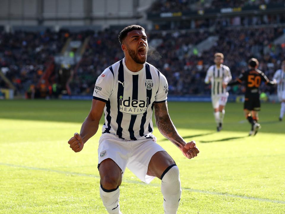 Darnell Furlong celebrates his goal against Hull in front of the Albion fans
