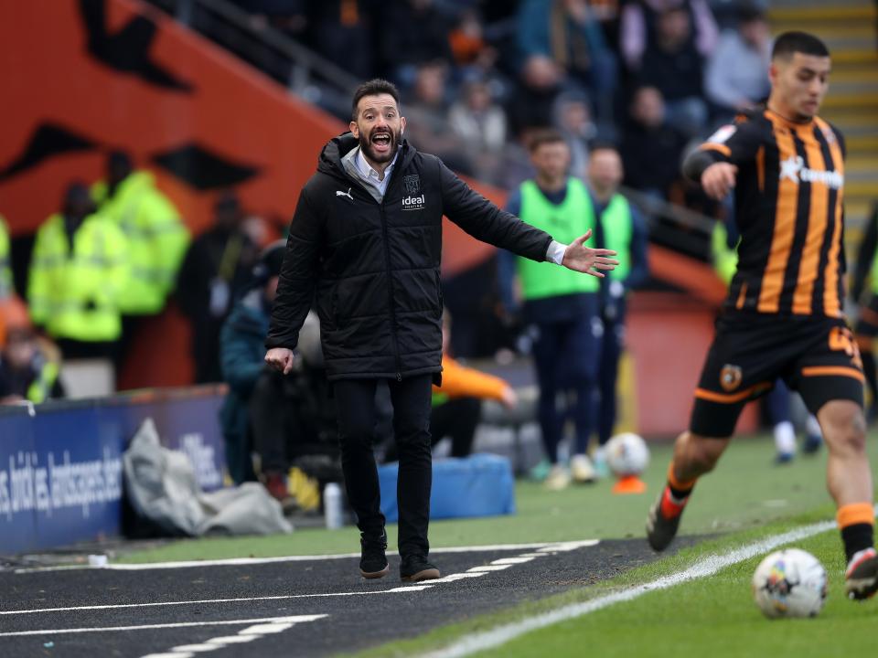 Carlos Corberán on the touchline watching Albion's game against Hull