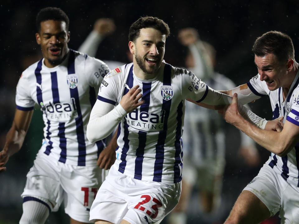 Mikey Johnston celebrates scoring against Plymouth with Jed Wallace and Grady Diangana