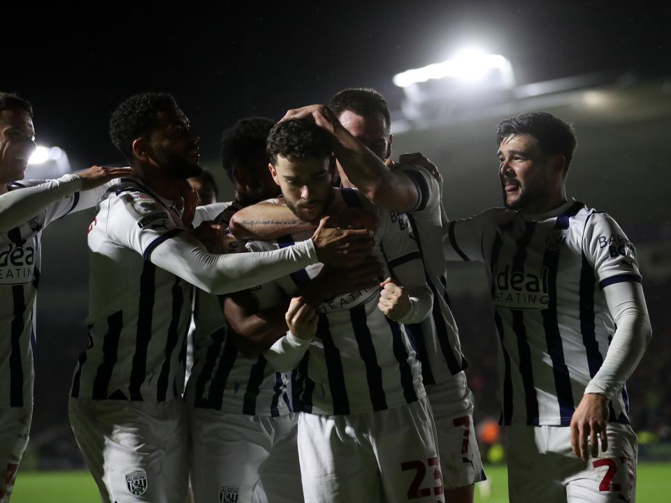 Mikey Johnston celebrates scoring against Plymouth with several team-mates
