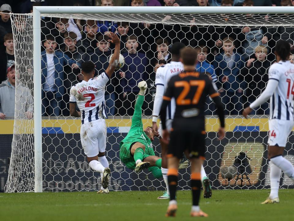 Alex Palmer dives to make a save against Hull