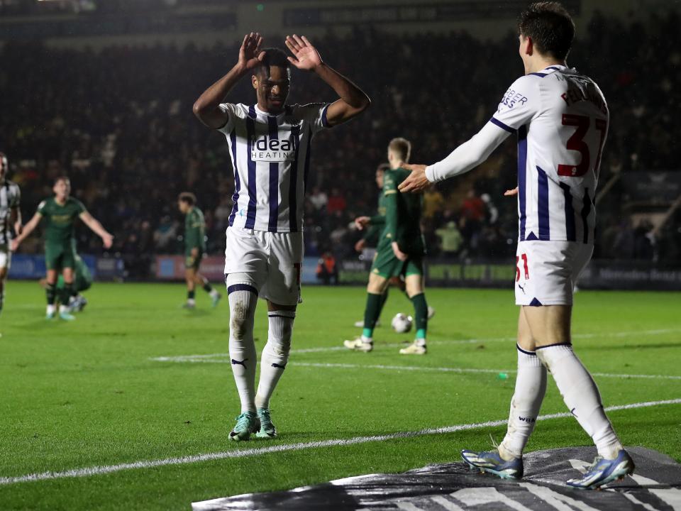 Tom Fellows celebrates scoring against Plymouth with Grady Diangana