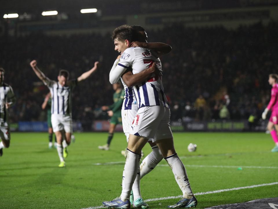 Tom Fellows celebrates scoring against Plymouth with Grady Diangana