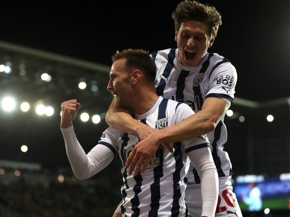 Andi Weimann celebrates scoring against Cardiff with Adam Reach