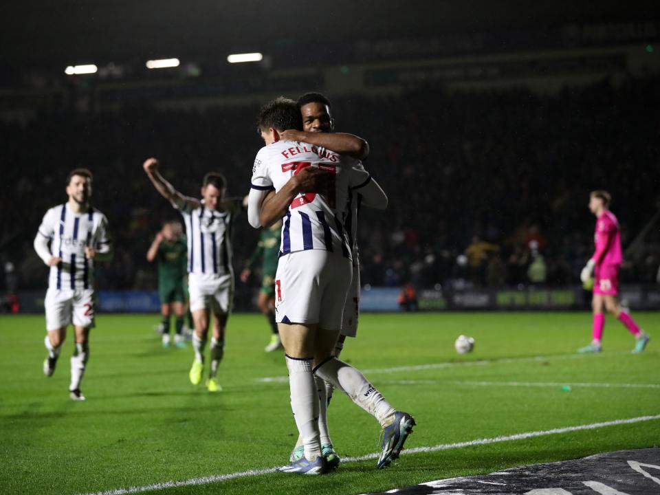 Tom Fellows celebrates scoring against Plymouth with Grady Diangana