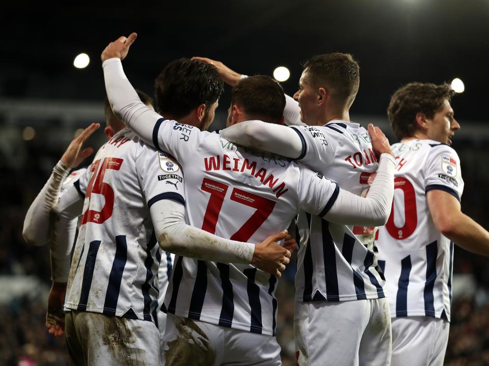 Andi Weimann celebrates scoring against Cardiff with team-mates
