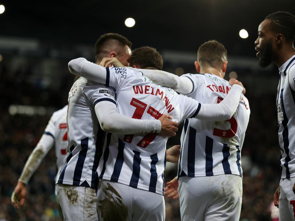 Andi Weimann celebrates scoring against Cardiff with team-mates