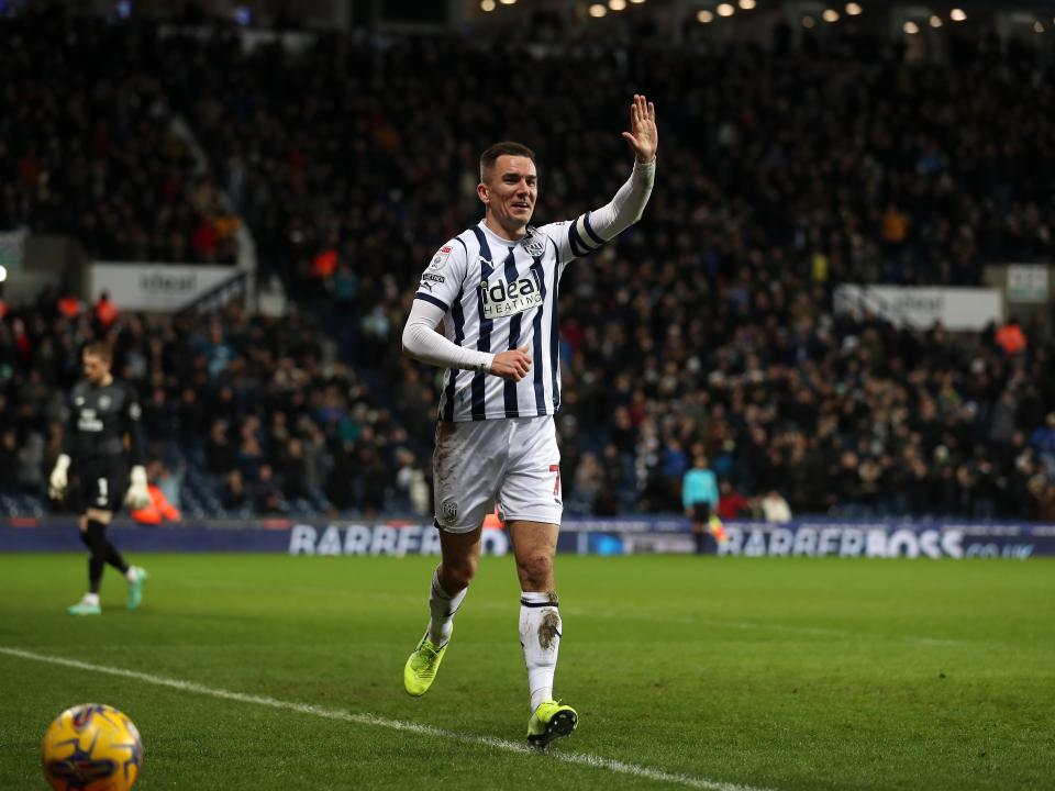 Jed Wallace runs over to celebrate with Andi Weimann after scoring against Cardiff