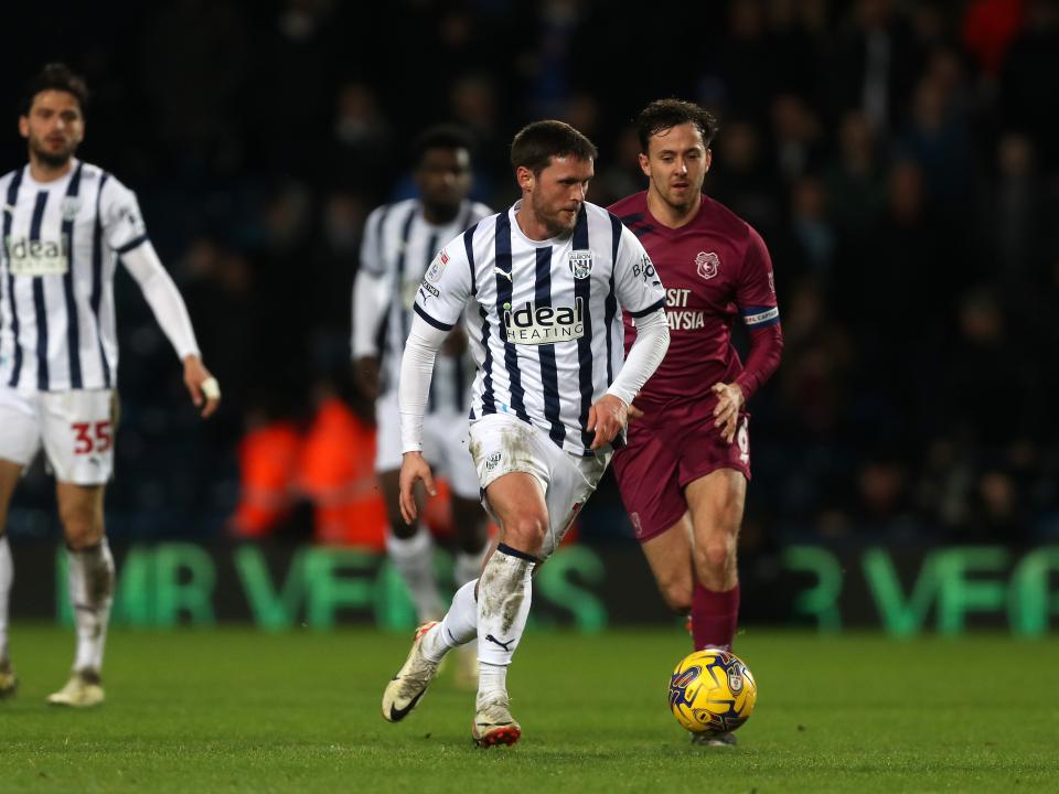 John Swift on the ball against Cardiff City
