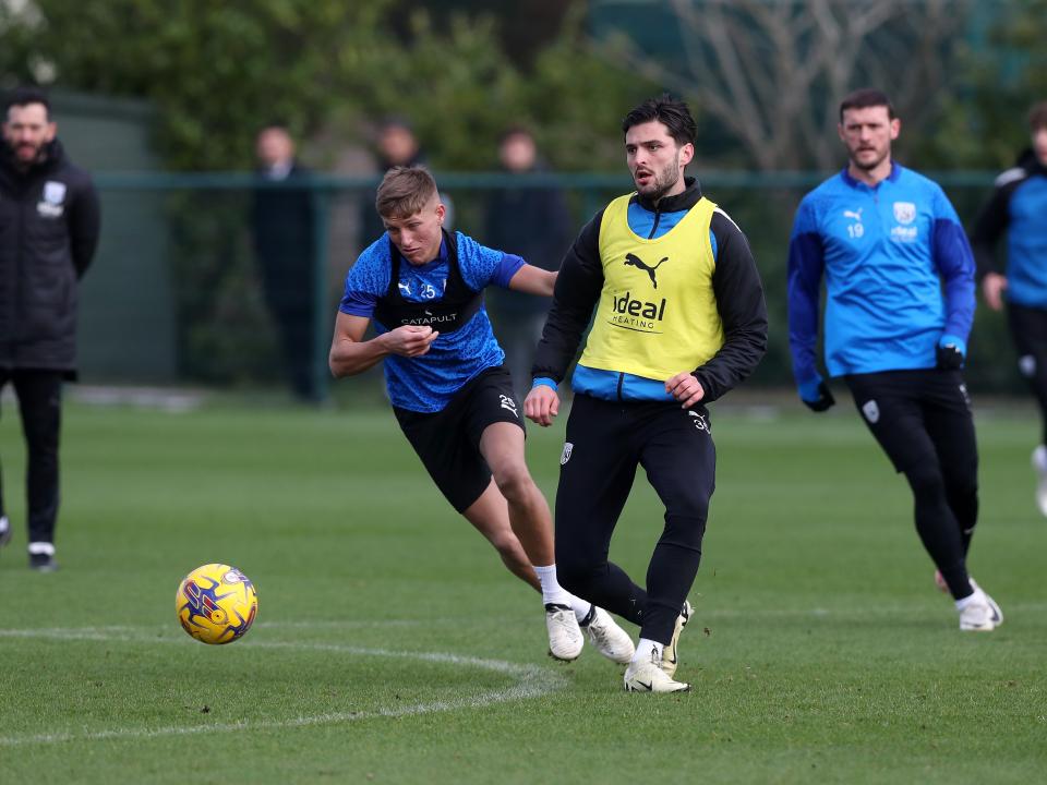 Okay Yokuslu passes the ball during training 