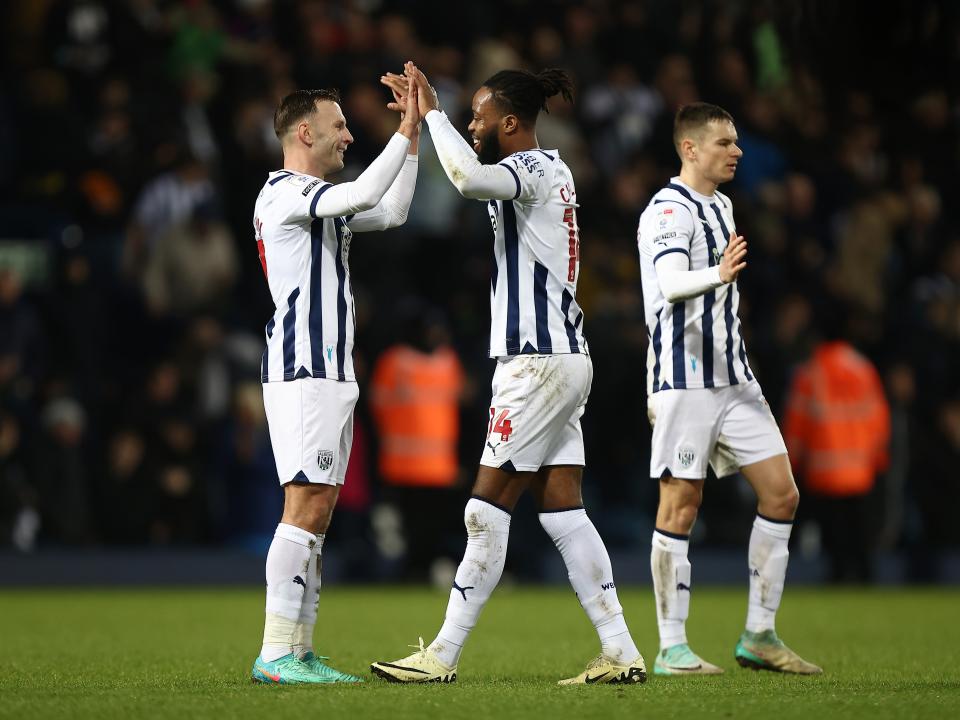 Nathanial Chalobah and Andi Weimann high five at full-time