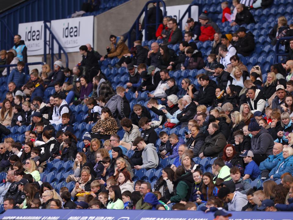A general view of Albion fans in the East Stand at The Hawthorns watching a training session