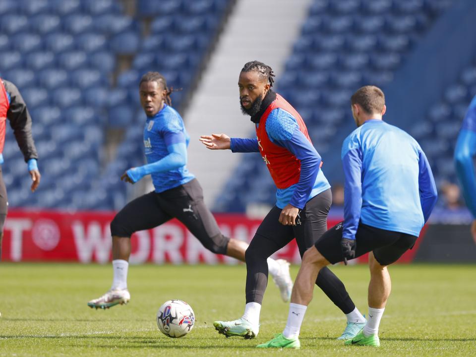 Nathaniel Chalobah making a pass during a training session at The Hawthorns
