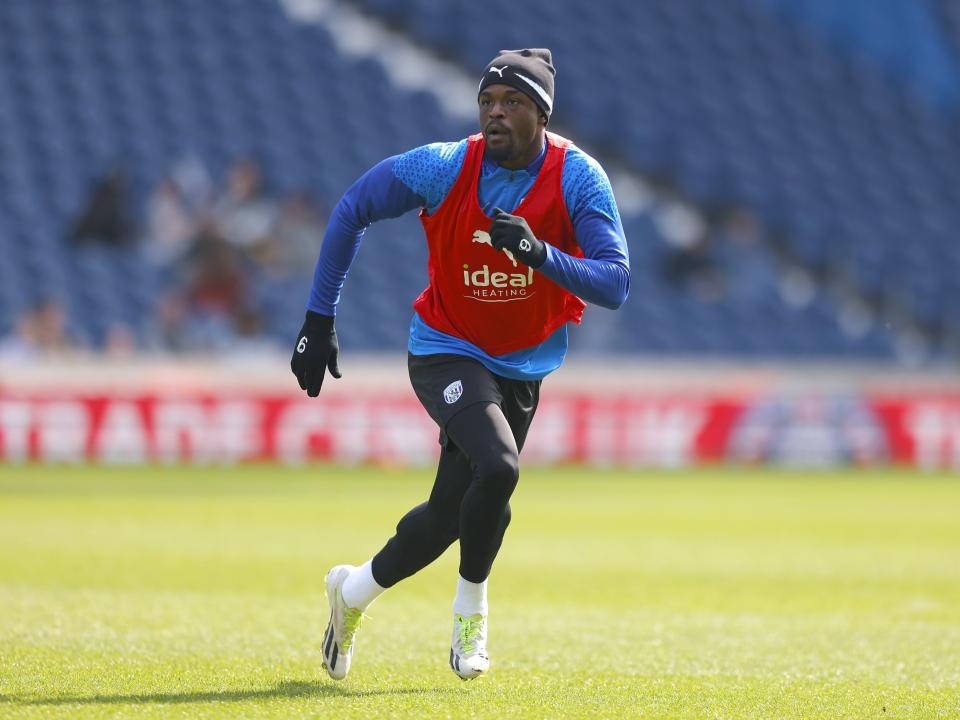Josh Maja running forward watching the ball during a training session at The Hawthorns