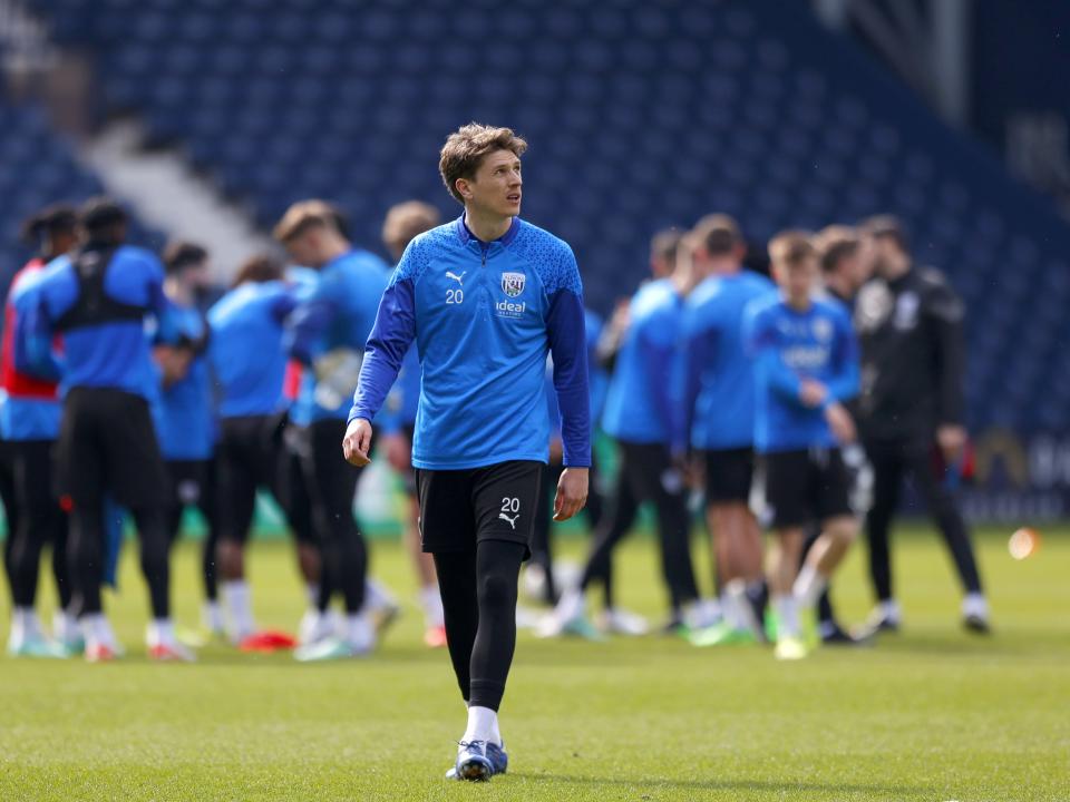 Adam Reach looking up at the sky during a break in the training session at The Hawthorns