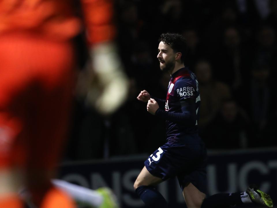 Mikey Johnston celebrates scoring a goal at QPR 
