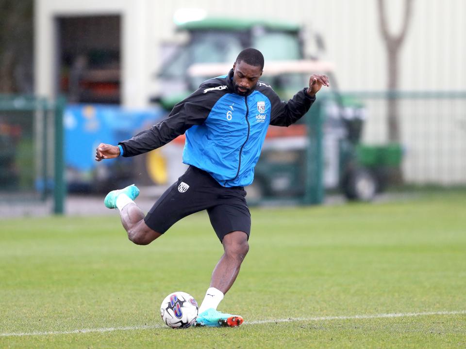 Semi Ajayi strikes the ball with his right foot in training 