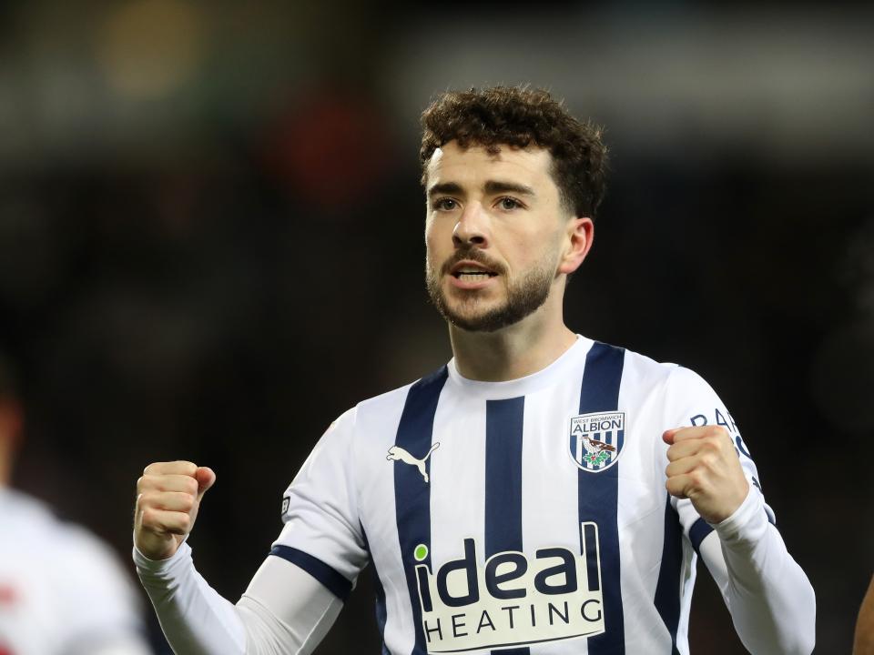 Mikey Johnston with his fists clenched after scoring against Coventry 