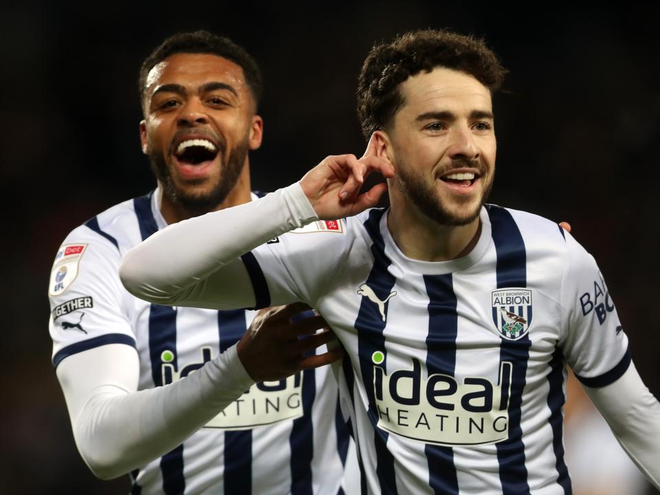 Mikey Johnston celebrates his goal against Coventry with Darnell Furlong