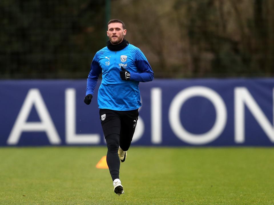 John Swift running during a training session