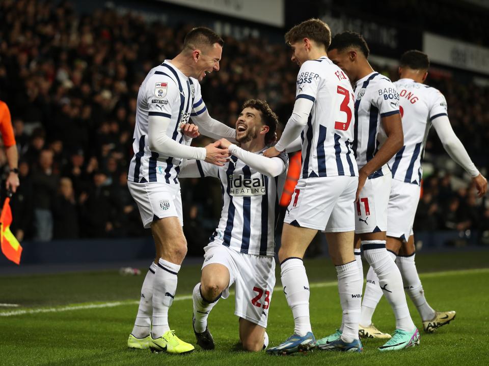 Mikey Johnston celebrates his goal against Coventry with several team-mates