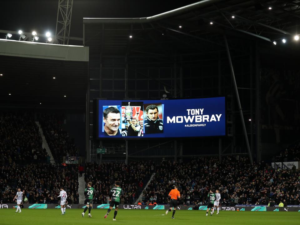 Tony Mowbray's picture up on the big screen at The Hawthorns in the 8th minute