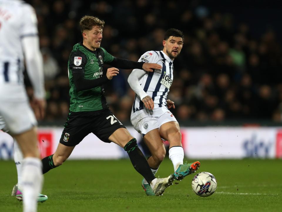 Alex Mowatt passes the ball against Coventry 