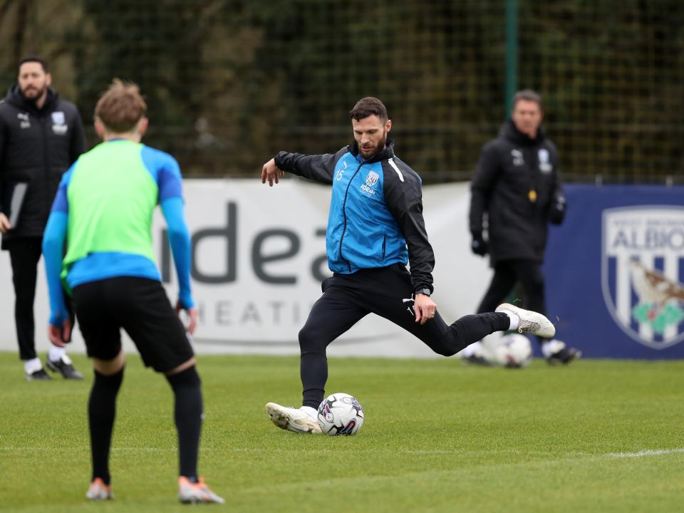 Erik Pieters striking the ball during a training session