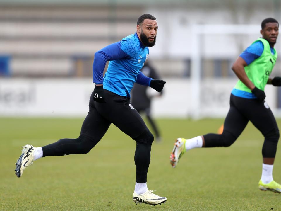 Matty Phillips running during a training session