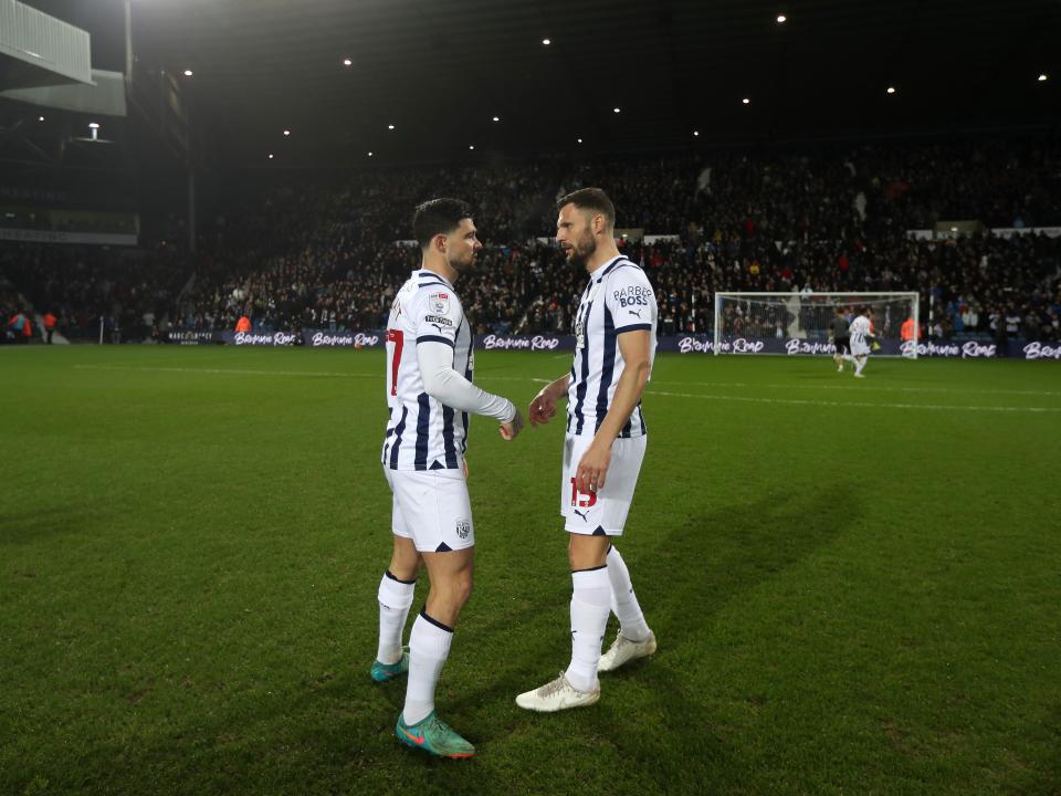 Erik Pieters and Okay Yokuslu facing each other on the pitch before the Coventry game