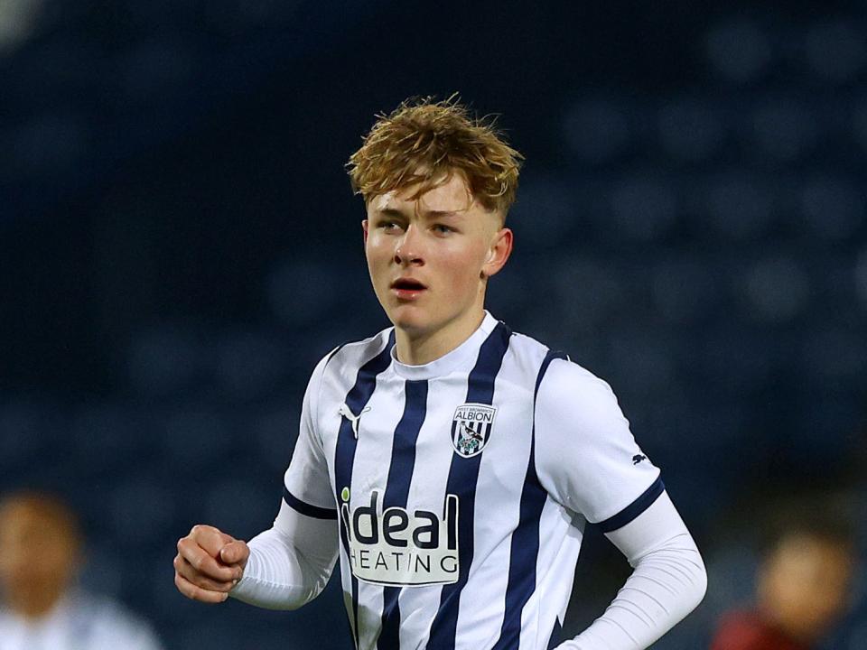 Ollie Bostock in action for Albion's PL2 team in the home kit