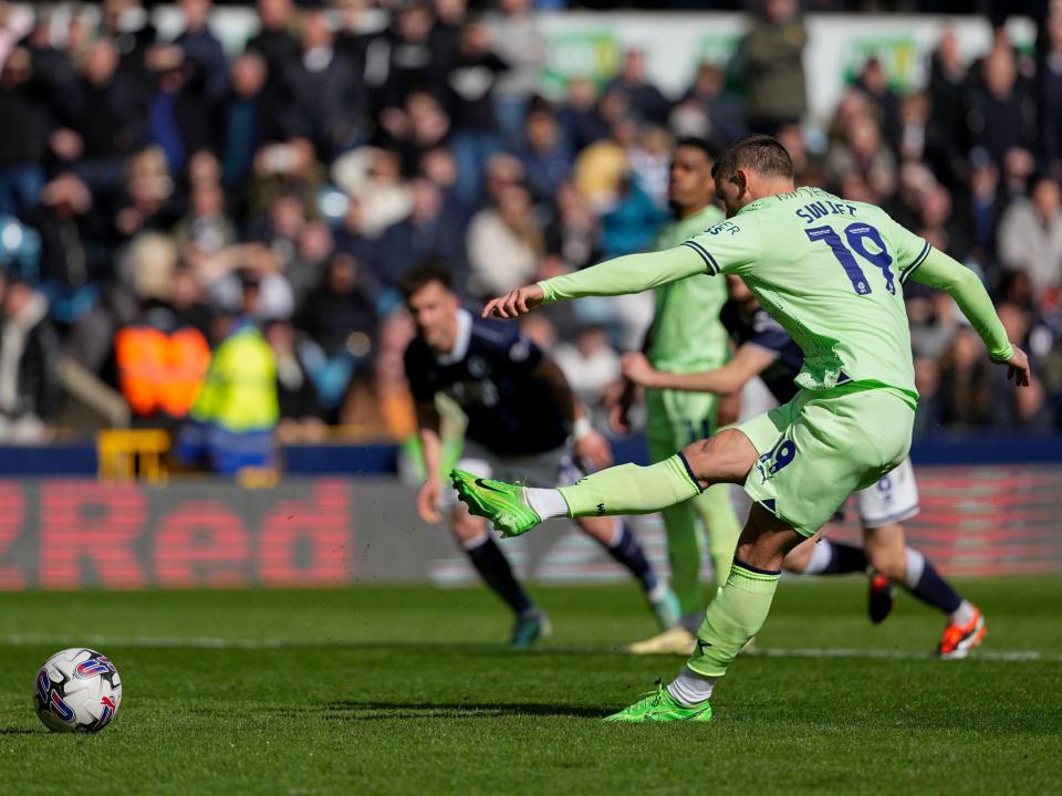 An image of John Swift scoring a penalty against Millwall