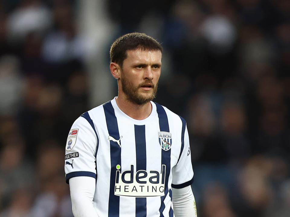 John Swift in the home kit during a match at The Hawthorns