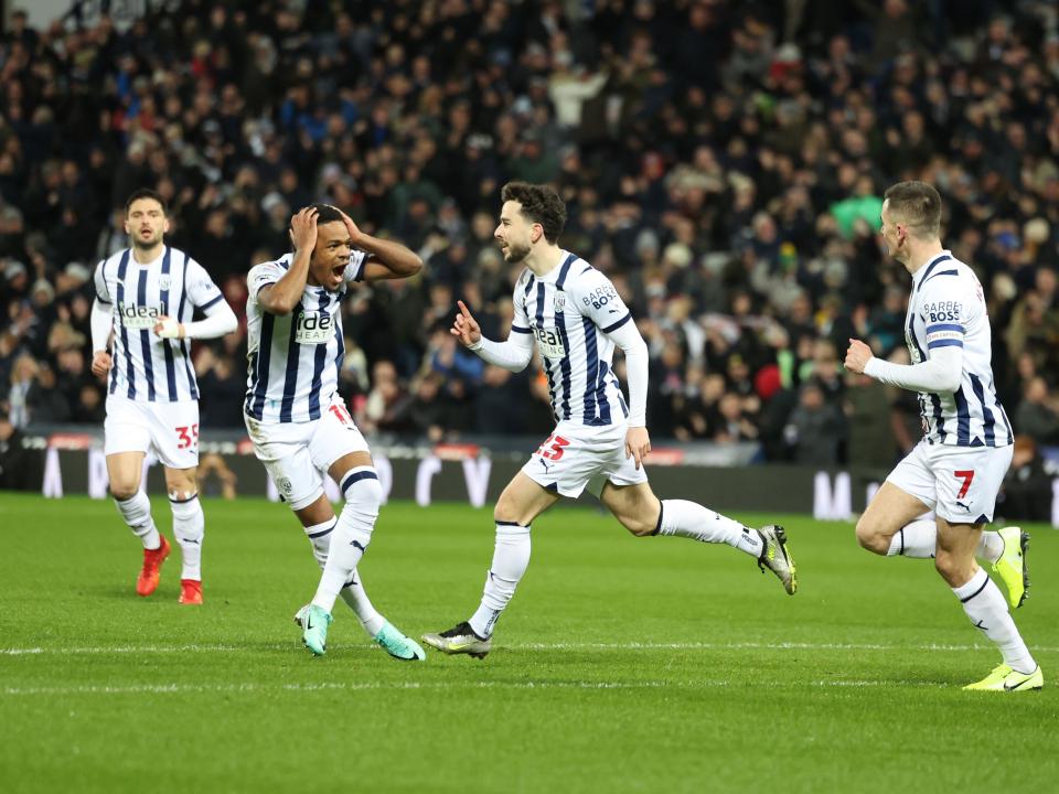 Mikey Johnston celebrates his goal against Coventry while Grady Diangana opens his mouth in amazement 