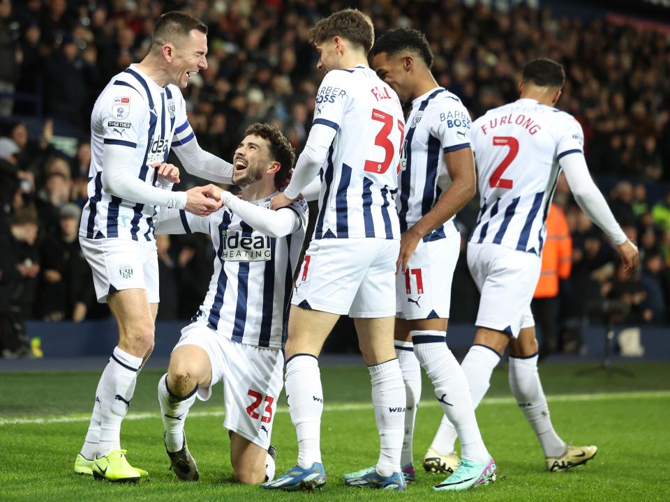 Mikey Johnston celebrates his goal against Coventry with several team-mates