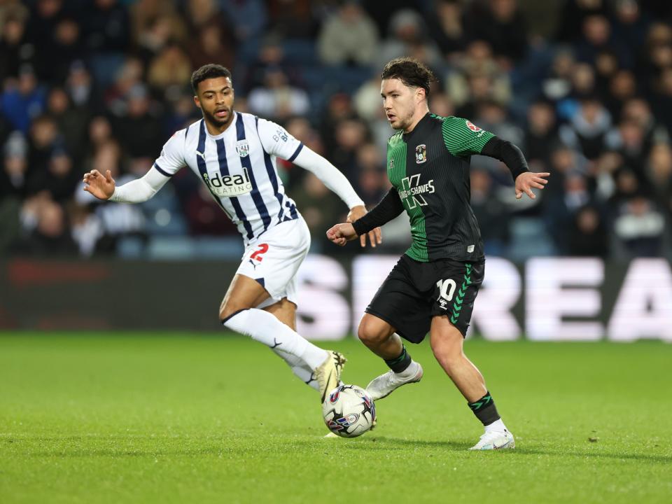 Darnell Furlong defending against a Coventry player 