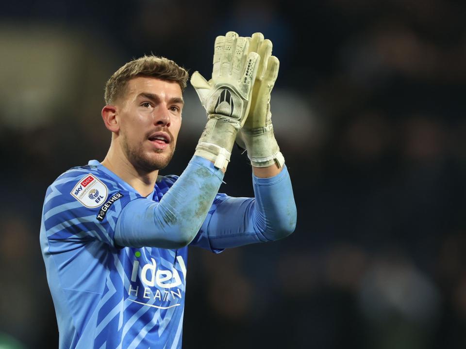Alex Palmer applauds Albion fans following the win over Coventry 