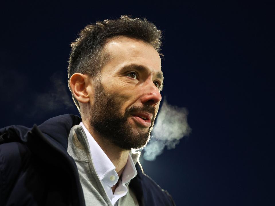 A close up shot of Carlos Corberán's face 