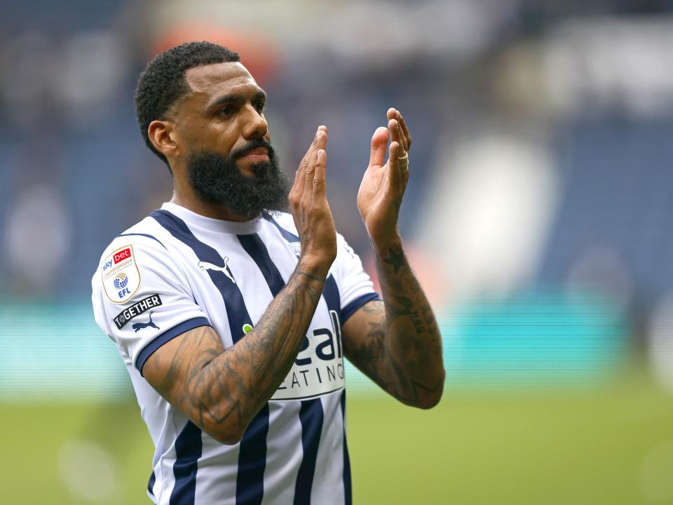 Yann M'Vila applauding supporters after the Watford game