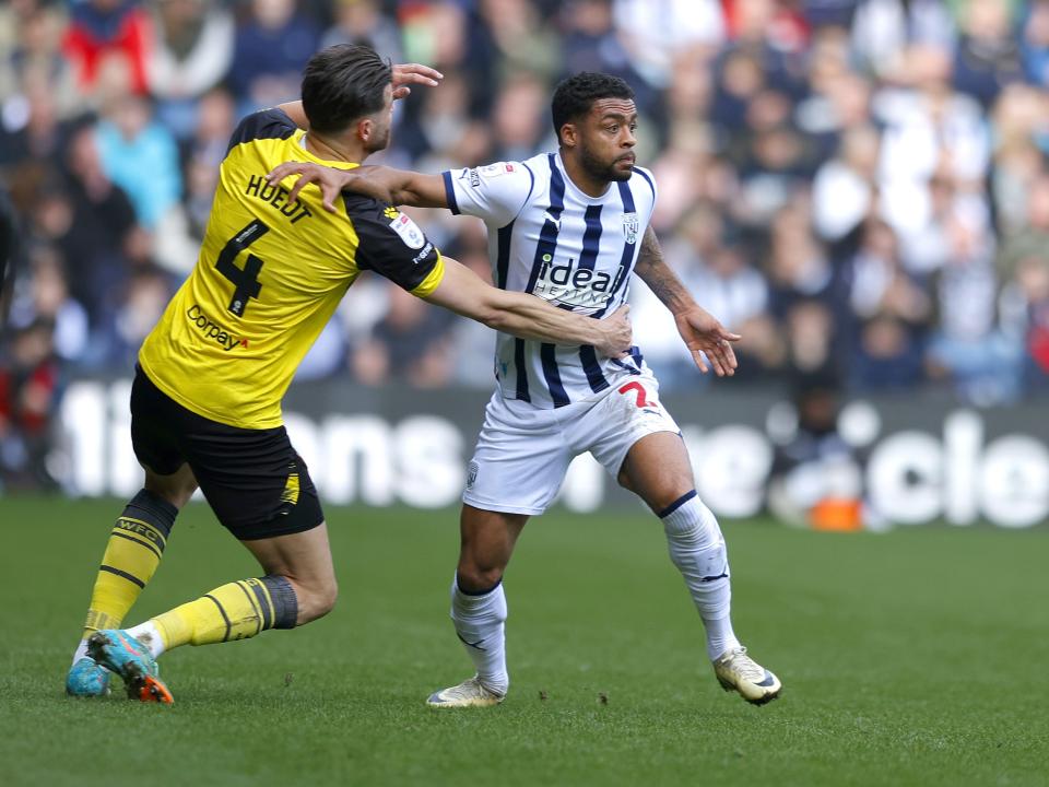 Darnell Furlong battles with a Watford player