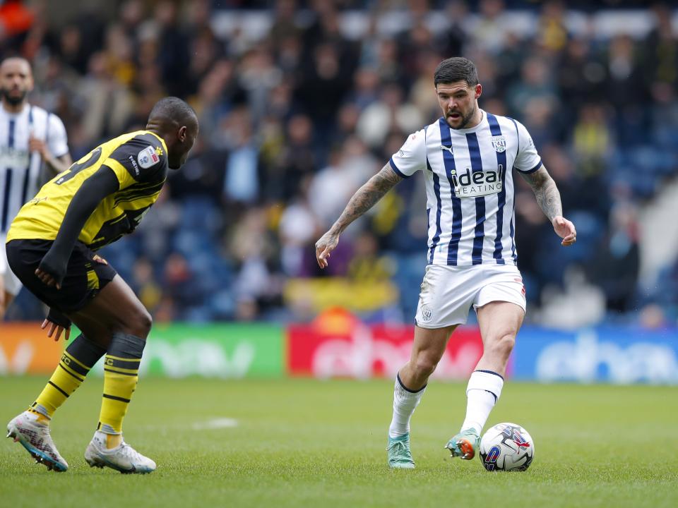 Alex Mowatt running with the ball against Watford 