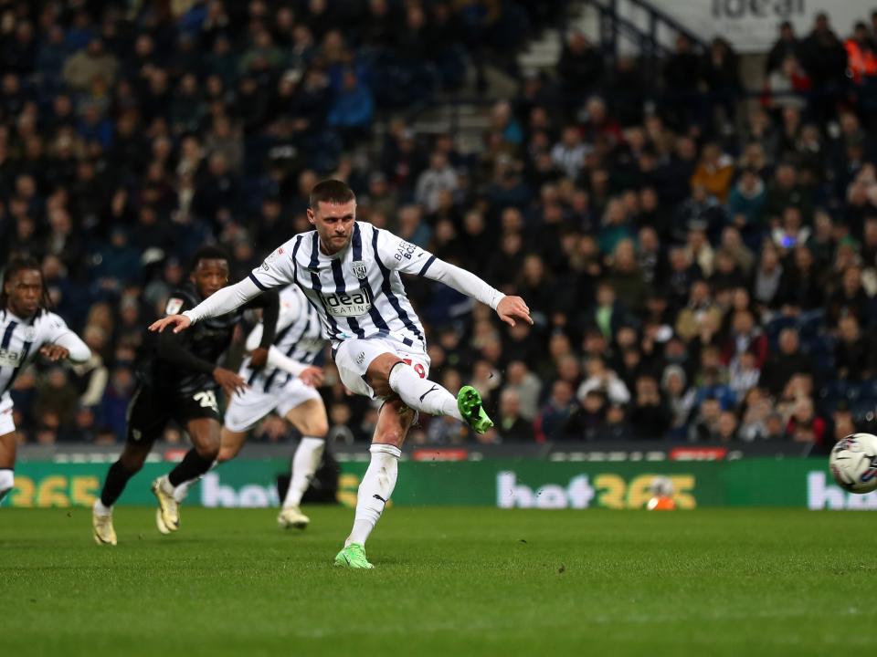 John Swift takes a penalty against Rotherham at The Hawthorns