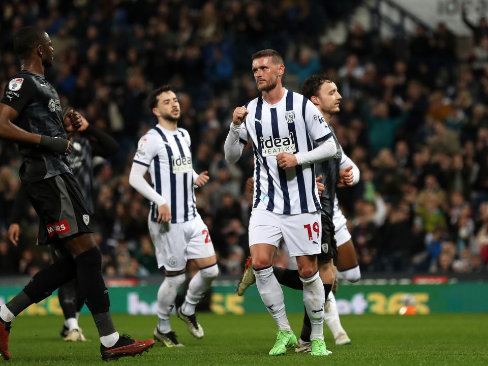 John Swift celebrates scoring a penalty against Rotherham United at The Hawthorns