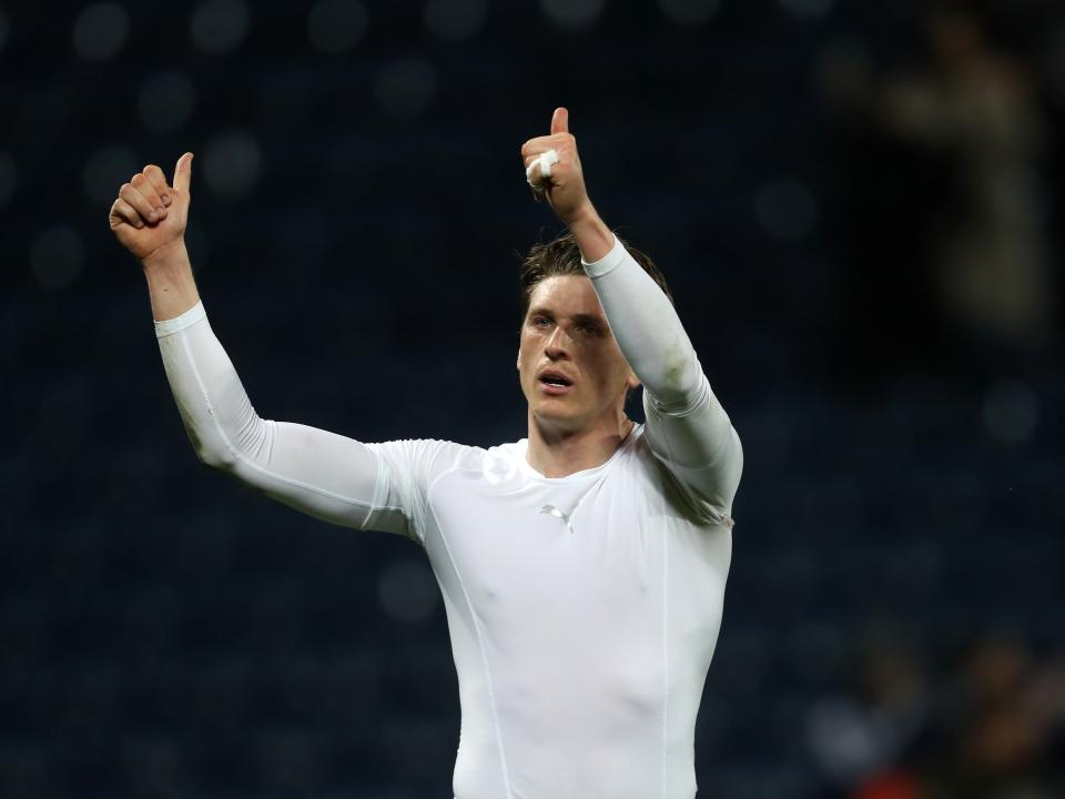 Adam Reach applauding Albion fans after the Rotherham game