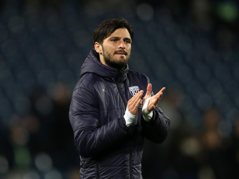 Okay Yokuslu applauding Albion fans after the Rotherham game