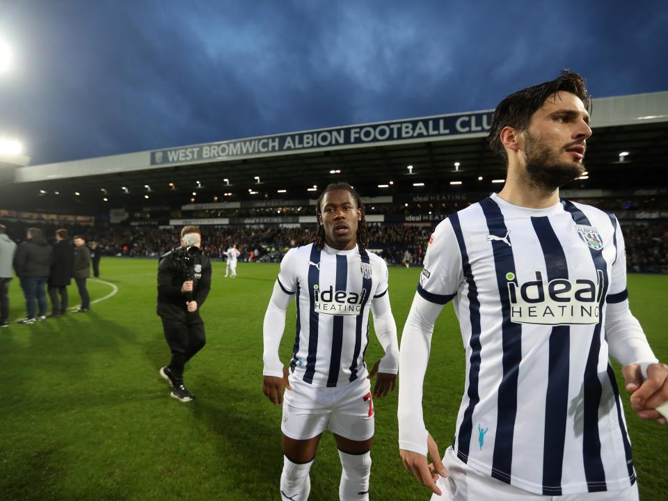 Okay Yokuslu and Brandon Thomas-Asante on the pitch before the Rotherham game