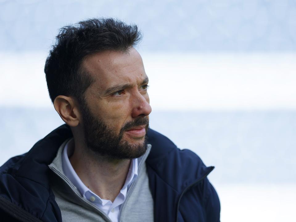 A close-up shot of the side of Carlos Corberán's face looking away from camera