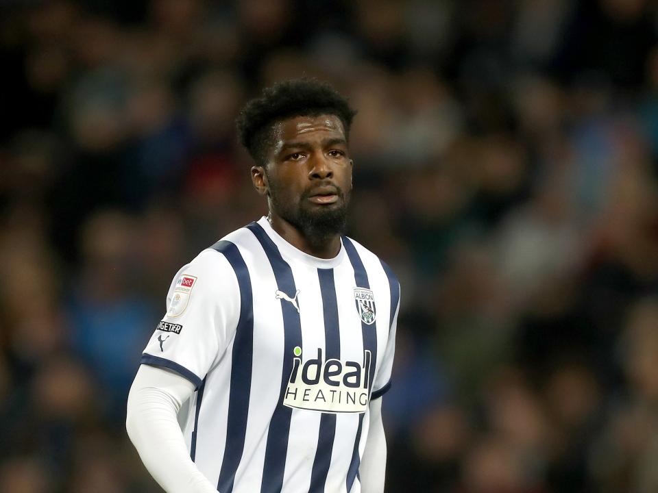 Cedric Kipre in action for Albion wearing the home kit 