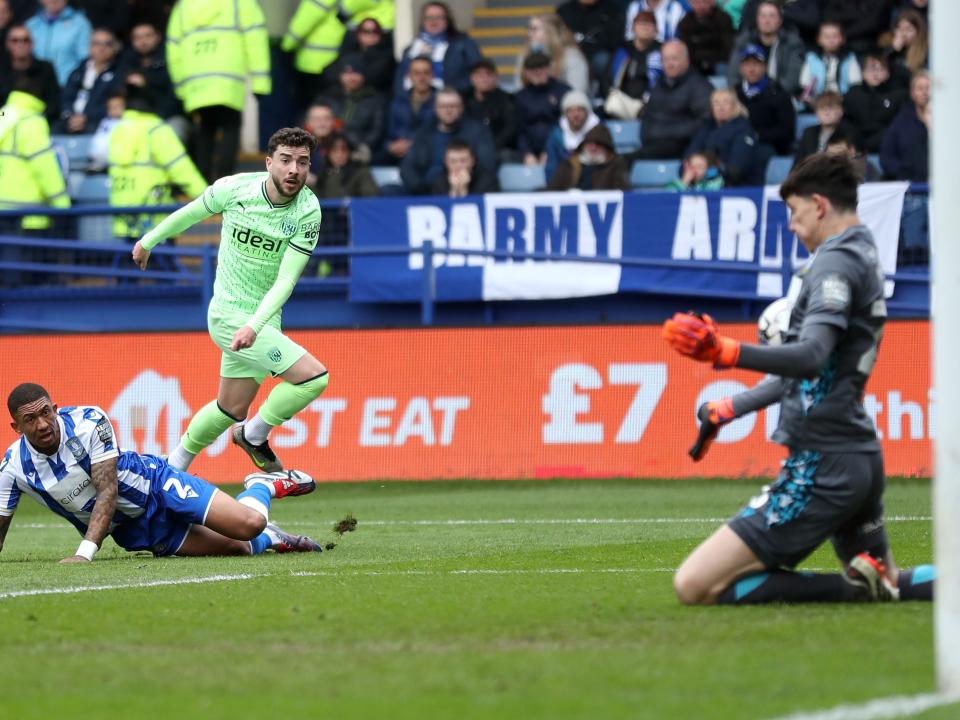 An image of Mikey Johnston shooting against Sheffield Wednesday