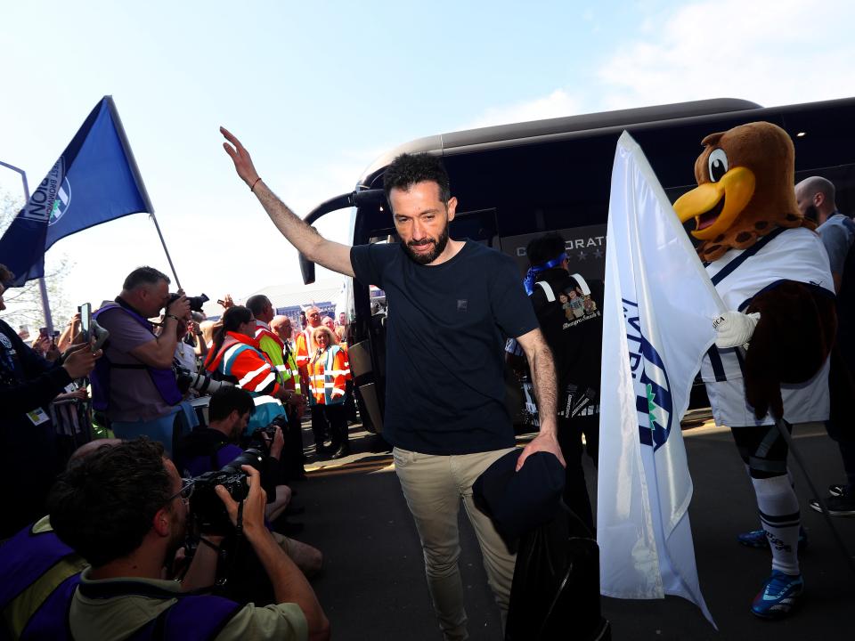 Carlos Corberán waving to supporters as he arrives at The Hawthorns before Albion's game with Southampton
